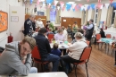 In the school hall with tables of activities